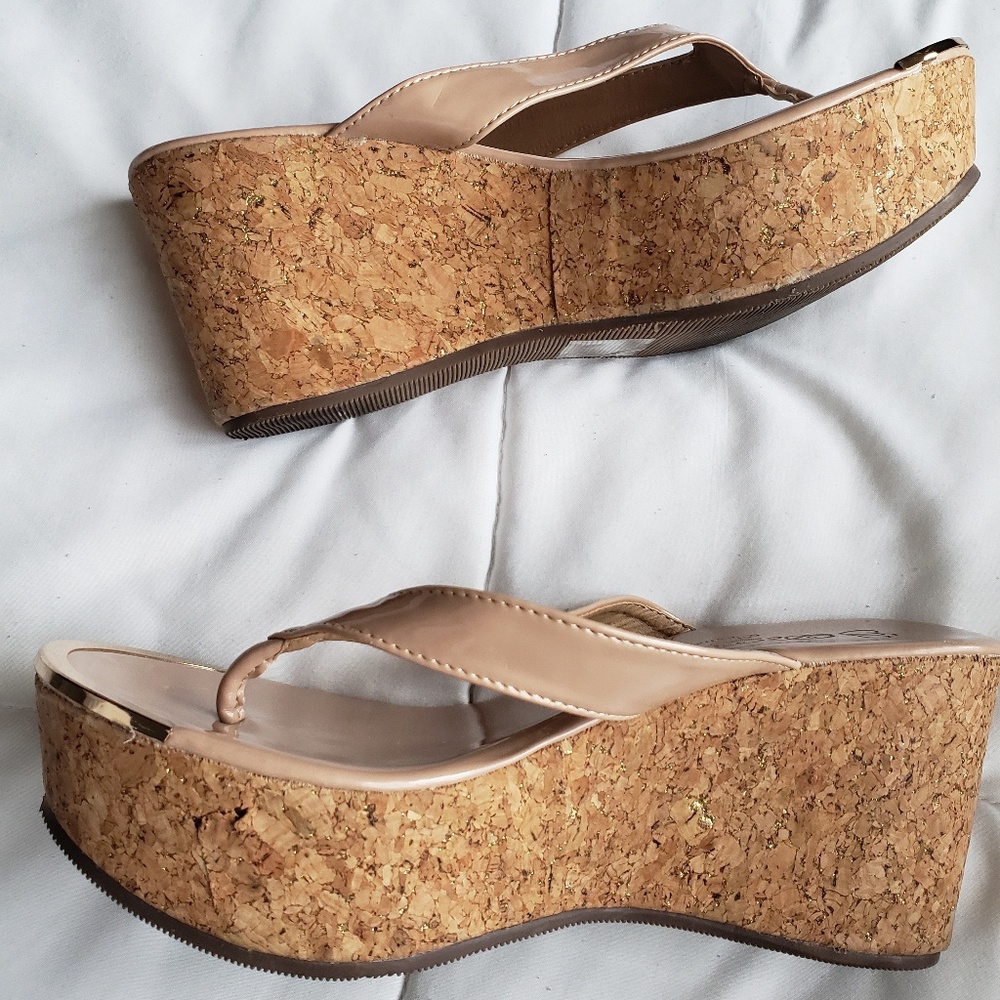 Womens wedges with gold trim in size 8.